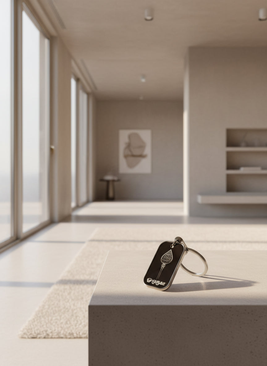 A custom print-on-demand keychain with a design printed on it, attached to a metal keyring.